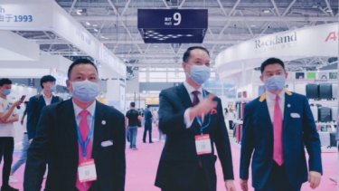 Michael Cheng, centre, touring the show floor of the 28th China (Shenzhen) International Gifts and Home Product Fair in June 2020, the first big show to take place after lockdown. 